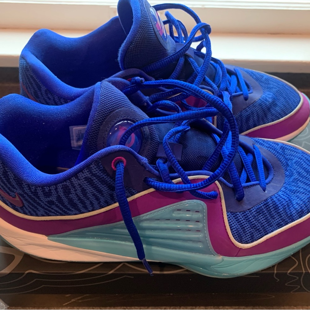 Nike KD16 Men’s Basketball Shoes
Color:  Blue / Purple / Teal / White
Sz: 11